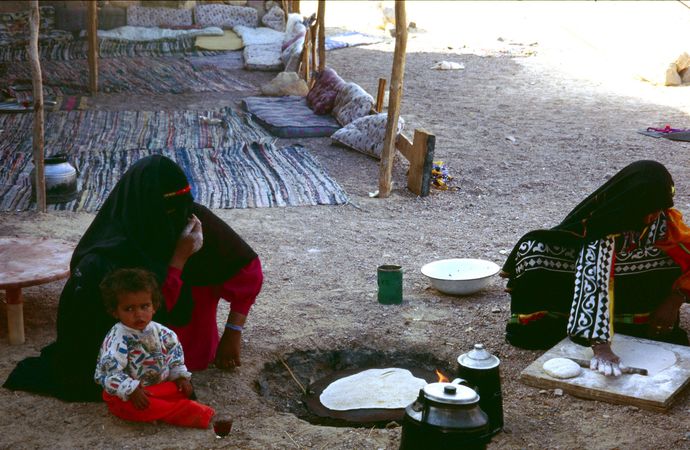 Sinai 03 - Bedouin women showing hospitality by baking bread